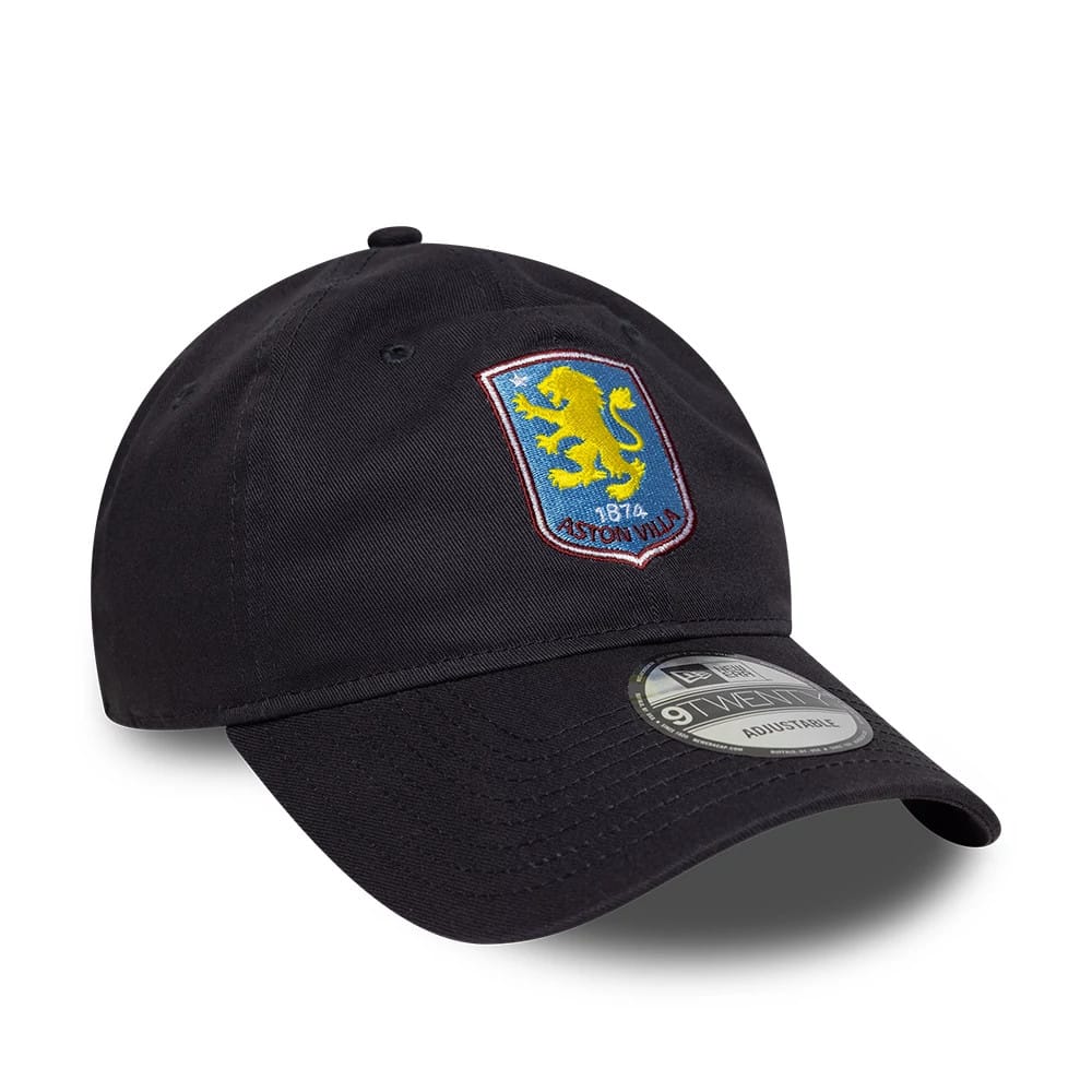 Aston Villa FC Core Navy New Era 9TWENTY Cap, three-quarter view showing the yellow and blue Aston Villa crest with embroidered details on the front panel, navy curved visor and a 9TWENTY size sticker.