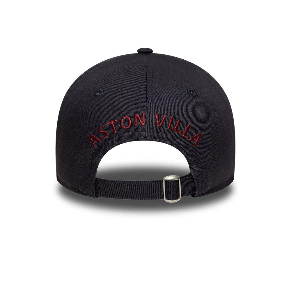 Aston Villa FC Core Navy New Era 9TWENTY Cap, rear view showing red embroidered Aston Villa lettering across the back panel with an adjustable strap and buckle below, complemented by matching navy eyelets on the crown.