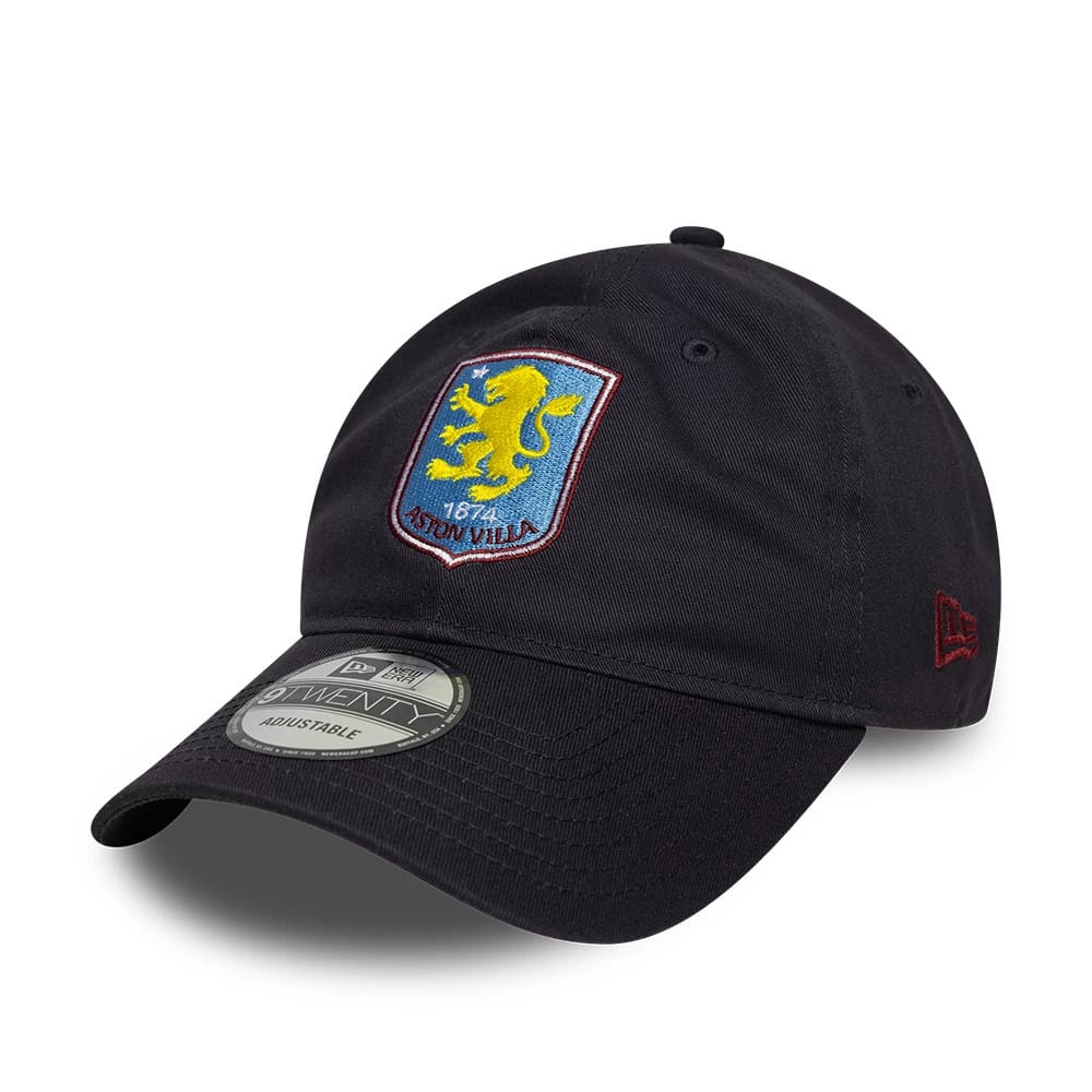 Aston Villa FC Core Navy New Era 9TWENTY Cap, front view showing the raised embroidered Aston Villa lion crest in yellow and blue centred on the unstructured navy crown, with a 9TWENTY size sticker on the curved visor.