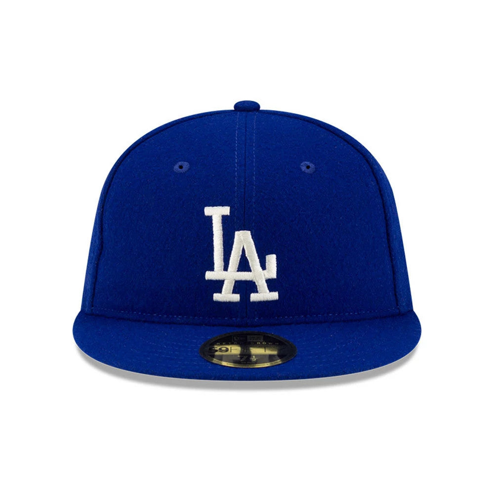 LA Dodgers FOG X MLB Dark Blue Retro Crown New Era 59FIFTY Fitted Cap, front view showing the raised white LA logo in embroidery on the dark blue crown, with a flat visor and a gold 59FIFTY size sticker.