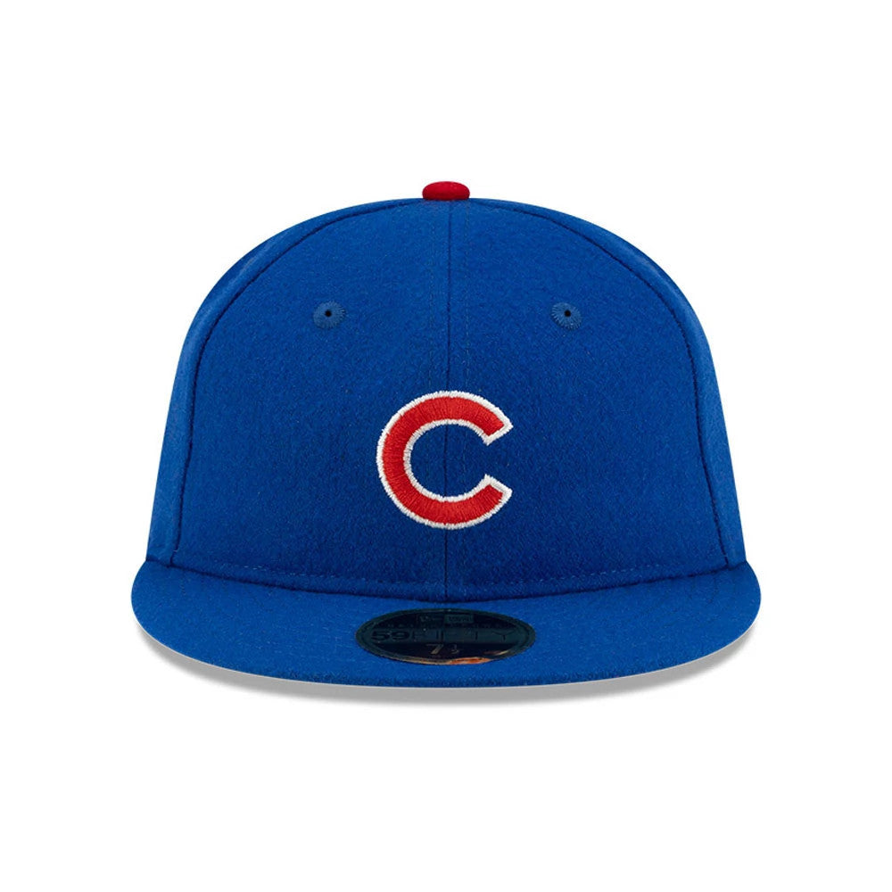 Chicago Cubs FOG X MLB Blue Retro Crown New Era 59FIFTY Fitted Cap, front view showing the red and white embroidered C logo on the structured blue front panel, with a black 59FIFTY size sticker on the blue flat visor.