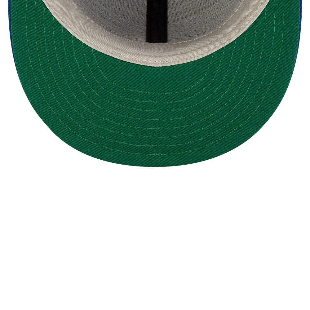 Chicago Cubs FOG X MLB Blue Retro Crown New Era 59FIFTY Fitted Cap, inside view showing green undervisor with stitching, grey sweatband, black internal taping and a structured design typical of the 59FIFTY silhouette.