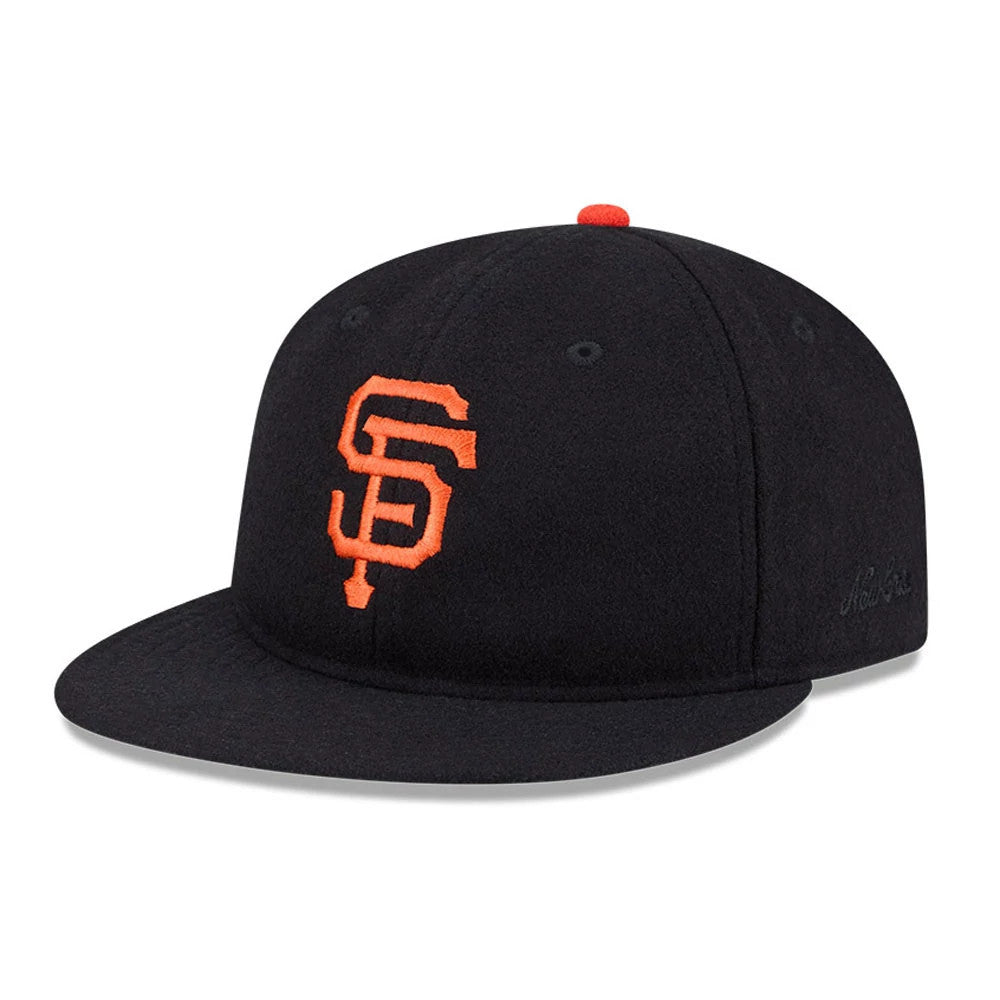 San Francisco Giants FOG X MLB Black Retro Crown New Era 59FIFTY Fitted Cap, three-quarter view showing the raised orange SF logo on the front panel, with a flat black visor and orange top button.
