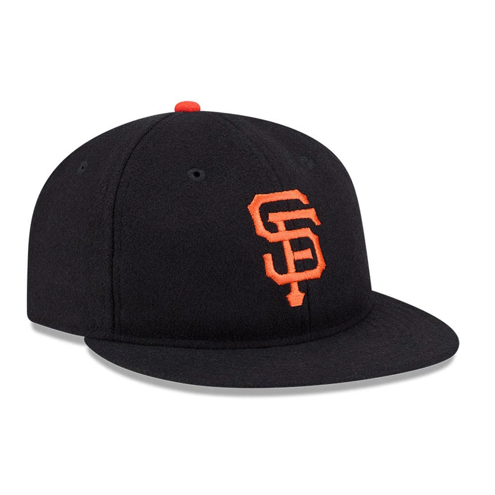 San Francisco Giants FOG X MLB Black Retro Crown New Era 59FIFTY Fitted Cap, three-quarter view showing the raised orange SF logo on the front panel, a flat black visor, and a red top button set against the dark crown.