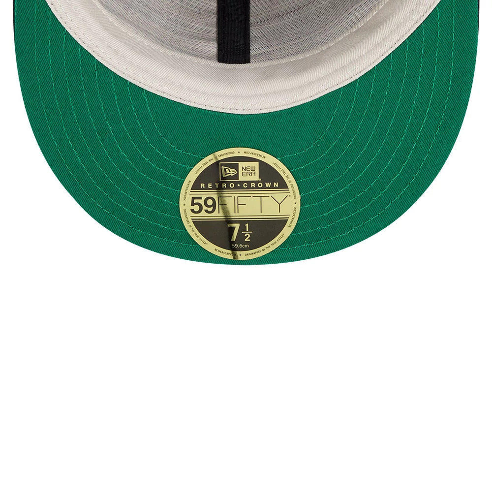 San Francisco Giants FOG X MLB Black Retro Crown New Era 59FIFTY Fitted Cap, inside view showing the green undervisor, gold 59FIFTY size sticker, grey taping, and black sweatband on the structured crown.