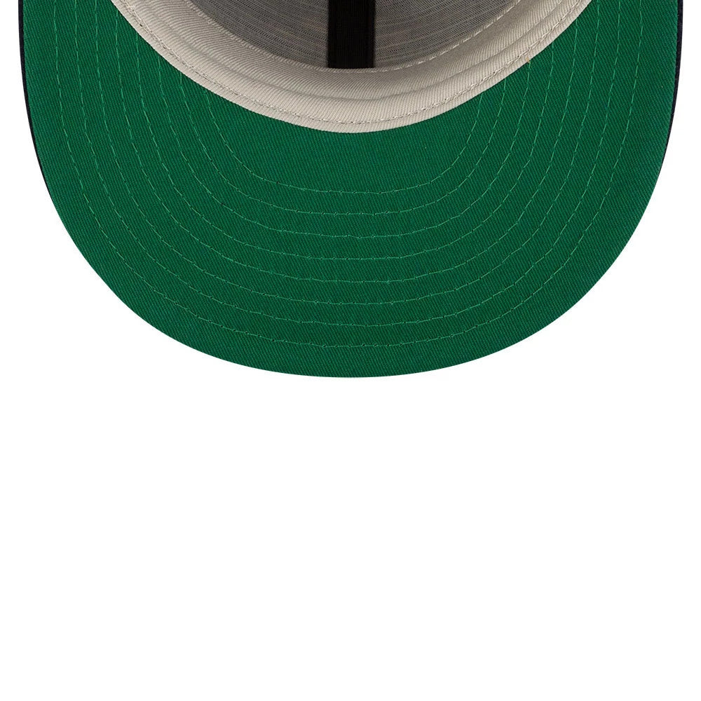 New York Yankees FOG X MLB Navy Retro Crown New Era 59FIFTY Fitted Cap, inside view showing the green undervisor, grey sweatband, and black internal taping, emphasising the structured design and quality stitching.