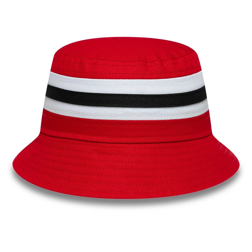 New Era Manchester United FC Infant Stripe Red Bucket Hat, front view showing the red crown with horizontal white and black stripes at the base, leading to a matching red visor with detailed stitching.