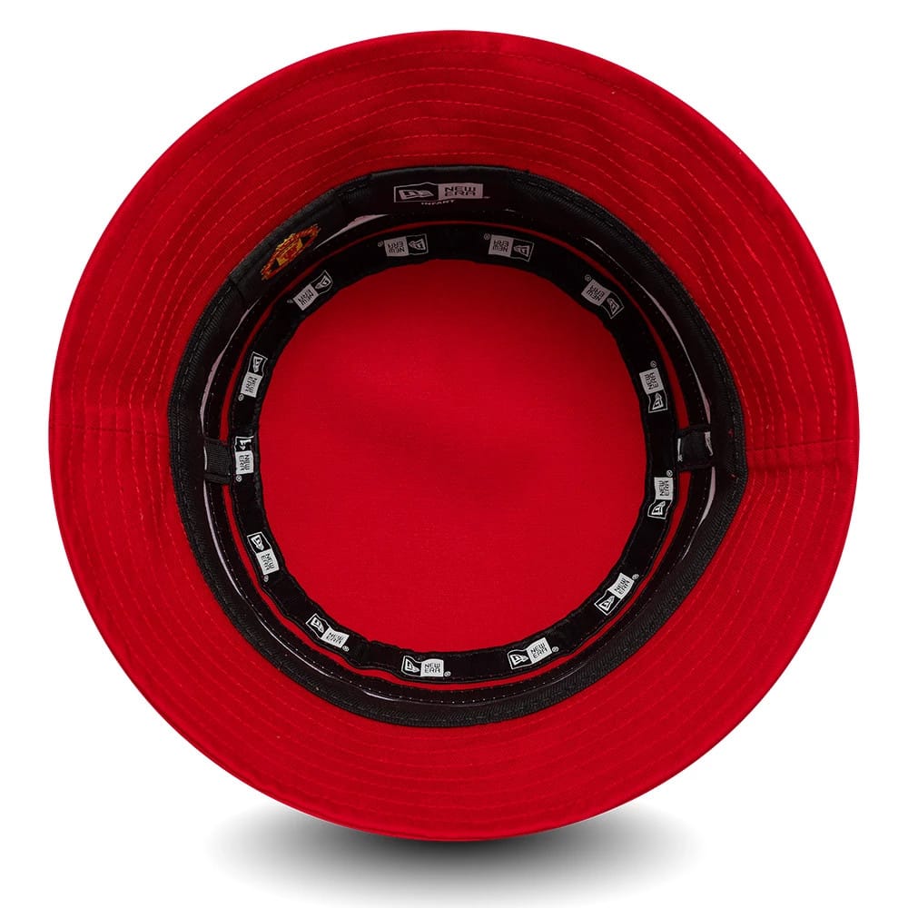 Pictured is this Infant Stripe Manchester United FC Bucket hat in red. 3