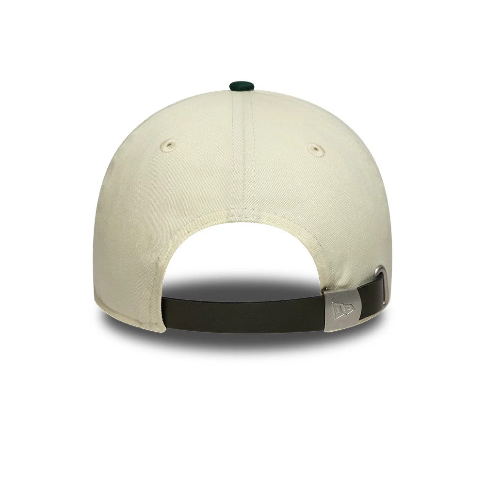 EDWIN x New Era Cream 9TWENTY Adjustable Cap, rear view showing the cream fabric with an adjustable dark strap and a silver New Era flag logo on the strap, set on an unstructured crown.