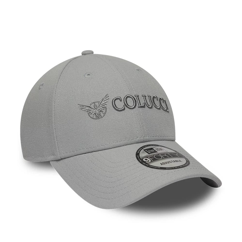 Colucci X New Era Grey 9FORTY Adjustable Cap, three-quarter view showing the raised embroidery of the Colucci logo on the structured grey crown, with a curved visor and a 9FORTY size sticker on top.