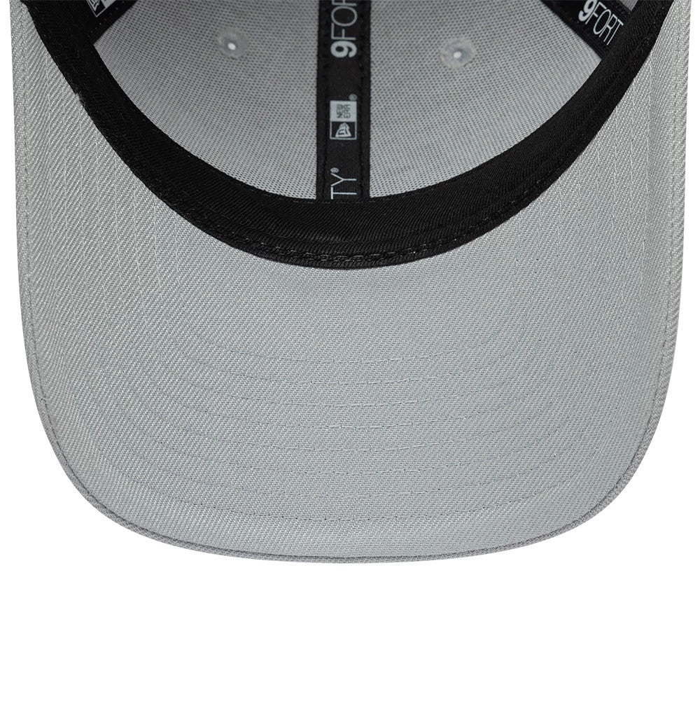 Colucci X New Era Grey 9FORTY Adjustable Cap, inside view showing the black taping with white 9FORTY branding and a black sweatband, set against a light grey undervisor with eyelets.