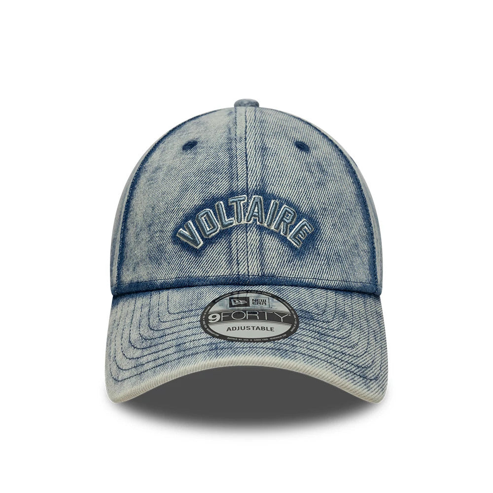 New Era X Zadig & Voltaire Pastel Blue 9FORTY Adjustable Cap, front view showing a VOLTAIRE raised embroidery on the faded blue denim front panel, with a grey 9FORTY size sticker on the curved visor.