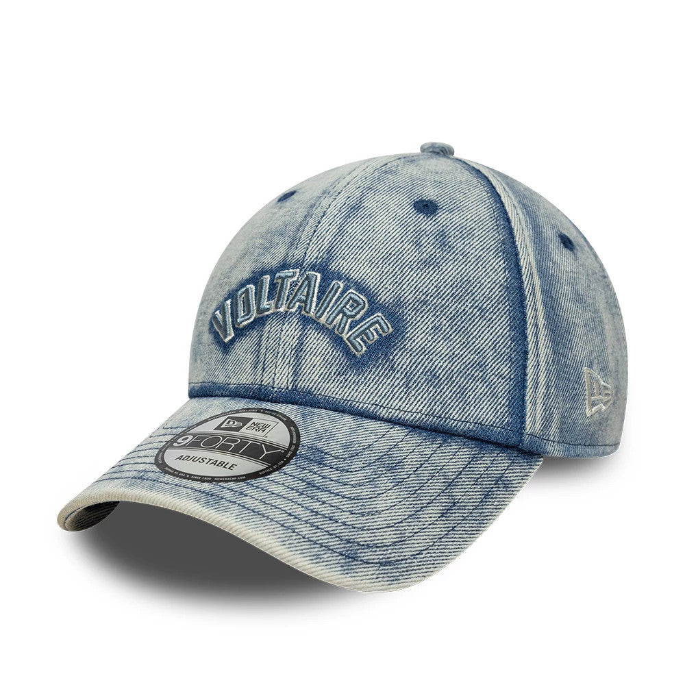 New Era X Zadig & Voltaire Pastel Blue 9FORTY Adjustable Cap, three-quarter view showing VOLTAIRE in raised blue embroidery on the front panel, a 9FORTY size sticker on the curved visor and an embroidered New Era flag logo on the left side.