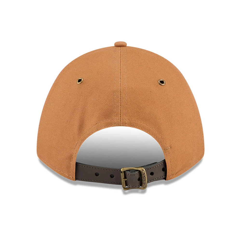 New Era Beige 9FORTY M-Crown Adjustable Cap, rear view showing the structured beige crown with silver eyelets, a top button, and a black adjustable strap featuring a buckle with the New Era logo.