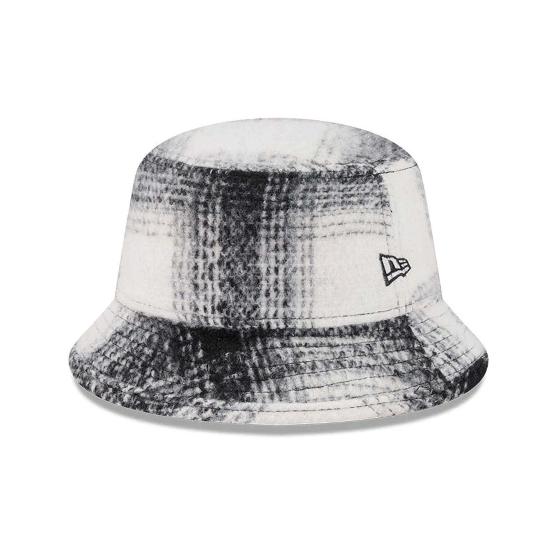 Pictured is this New Era Bucket hat in White & Black Plaid. 1