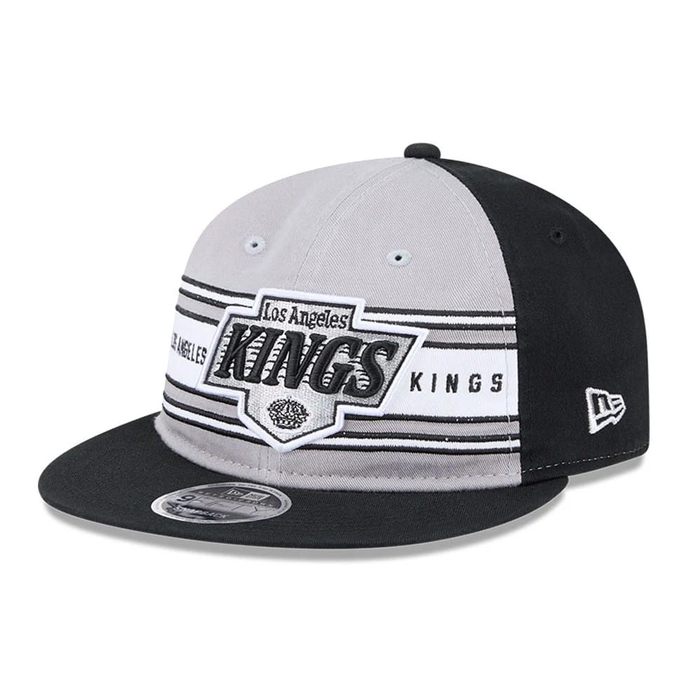 Pictured is this NHL Team Stripes LA Kings Retro Crown 9FIFTY cap in black. 1