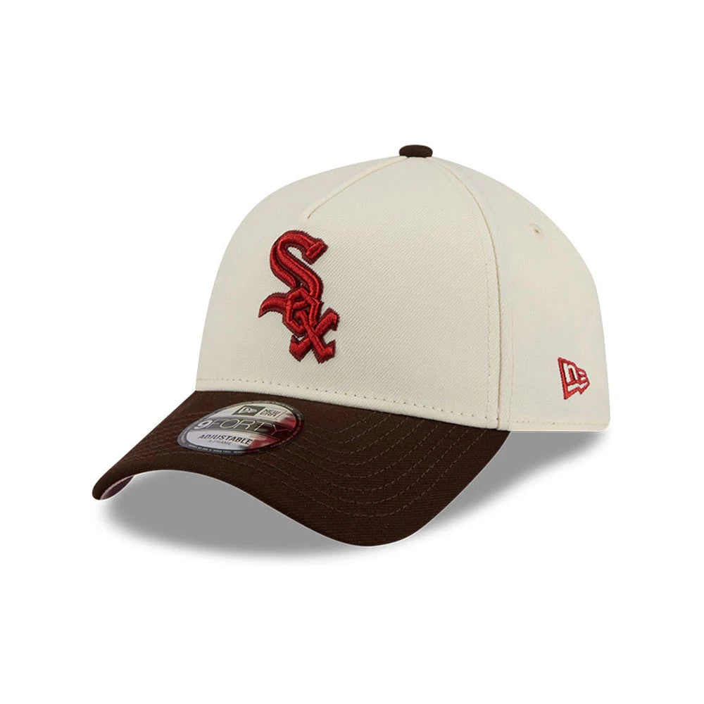 Chicago White Sox MLB City Script Cream New Era 9FORTY A-Frame Adjustable Cap, three-quarter view showing raised red embroidered Sox logo on the front panel, brown curved visor with 9FORTY size sticker, and red New Era flag on left side.