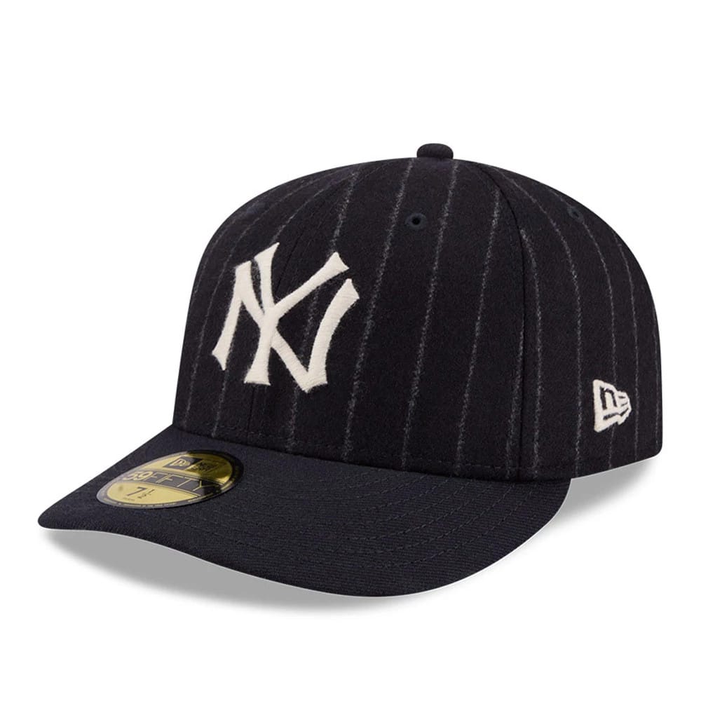 New York Yankees MLB X Moon Navy New Era 59FIFTY Fitted Cap, three-quarter view showing the white raised embroidered NY logo on the front panel, grey pinstripes across the navy crown, and New Era flag logo on the left side.