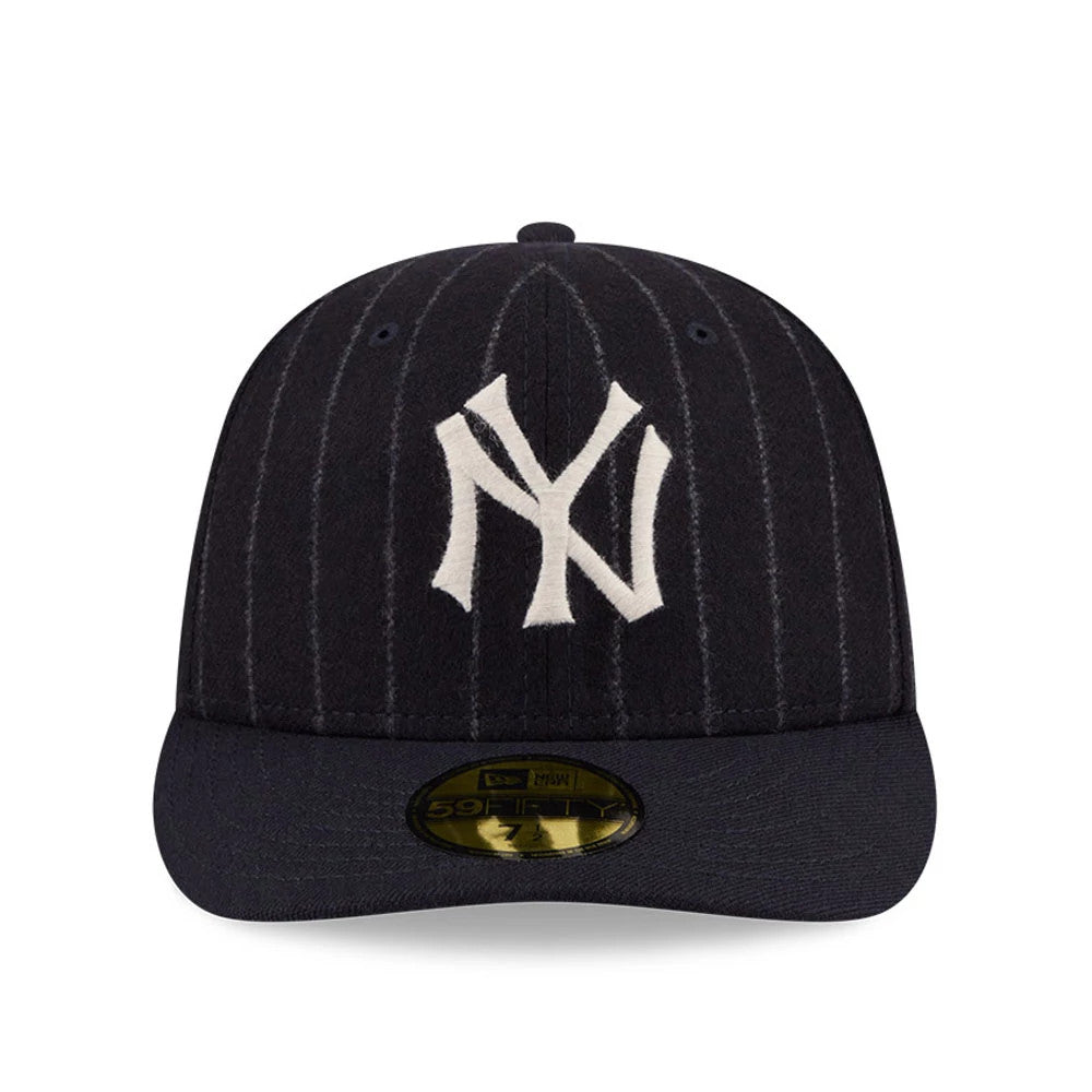 New York Yankees MLB X Moon Navy New Era 59FIFTY Fitted Cap, front view showing the white embroidered NY logo on the navy pinstriped crown with a flat visor and a gold 59FIFTY size sticker on the visor.