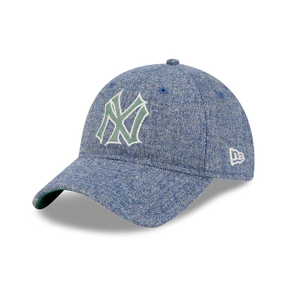 New York Yankees MLB X Moon Blue New Era 9TWENTY Adjustable Cap, front view showing the raised embroidered pale green NY logo on the denim-like blue crown, with a curved visor and New Era flag logo on the left side.