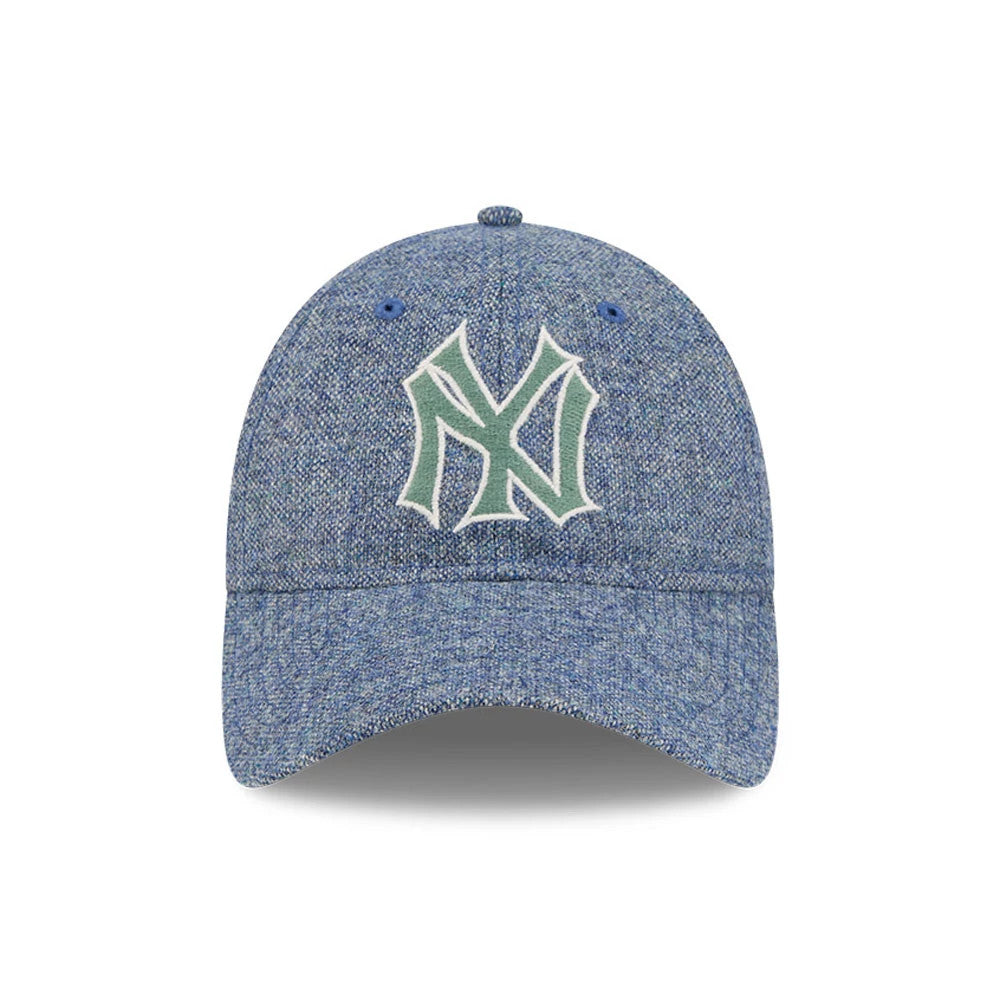 New York Yankees MLB X Moon Blue New Era 9TWENTY Adjustable Cap, front view showing the raised green embroidered NY logo on a textured blue crown with matching blue eyelets and a curved visor.