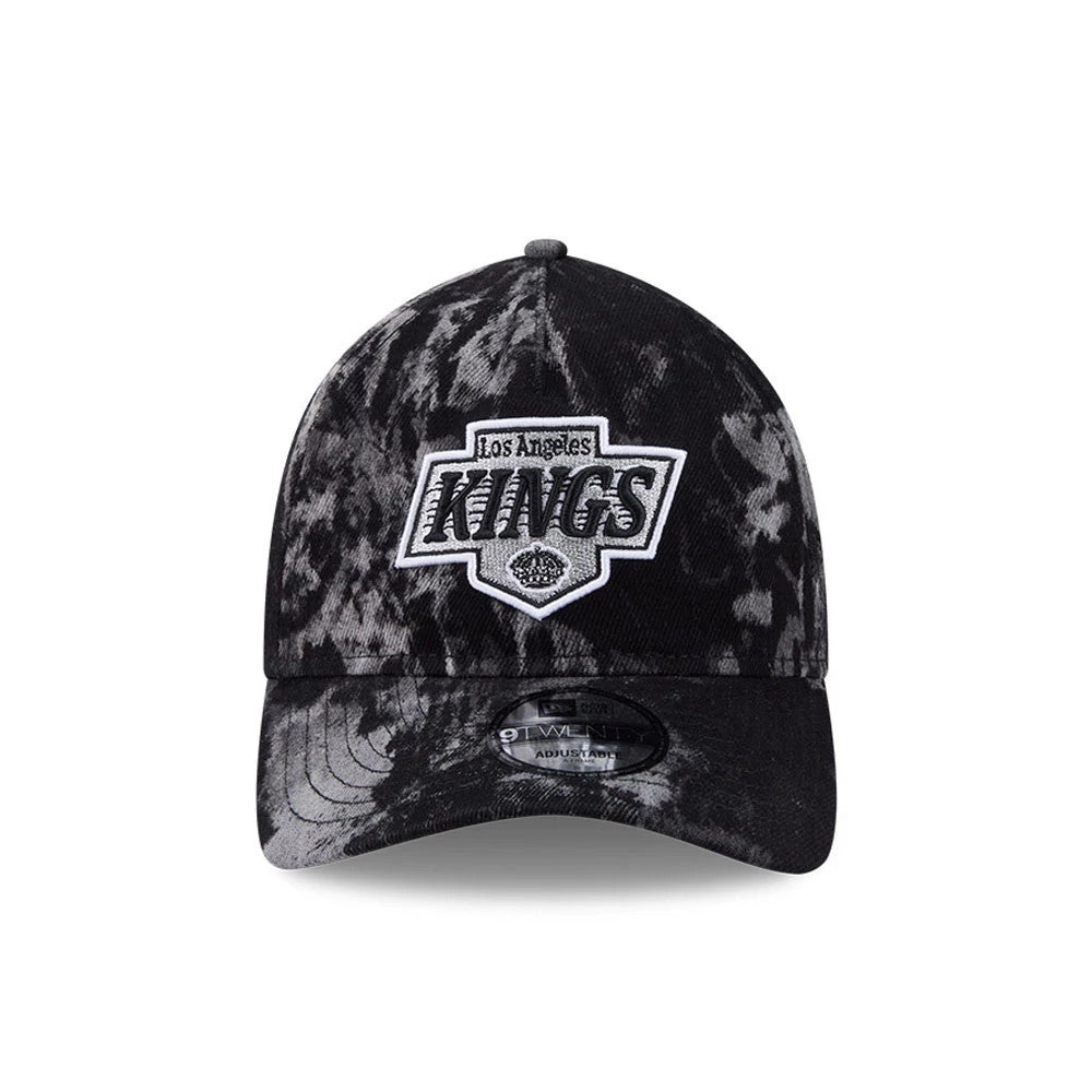 LA Kings NHL Bleached Denim Black New Era 9TWENTY A-Frame Adjustable Cap, front view showing a raised embroidered Kings logo on the front panel, with a curved visor and a 9TWENTY size sticker on the visor.