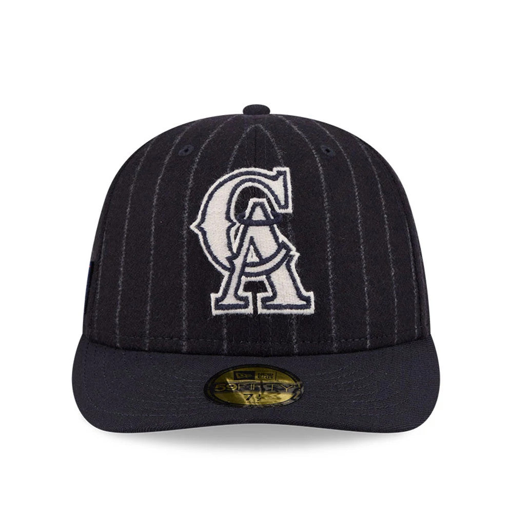LA Angels MLB X Moon Navy New Era 59FIFTY Fitted Cap, front view showing a white embroidered LA logo on the navy pinstripe crown with a navy flat visor and a gold 59FIFTY size sticker on the visor.