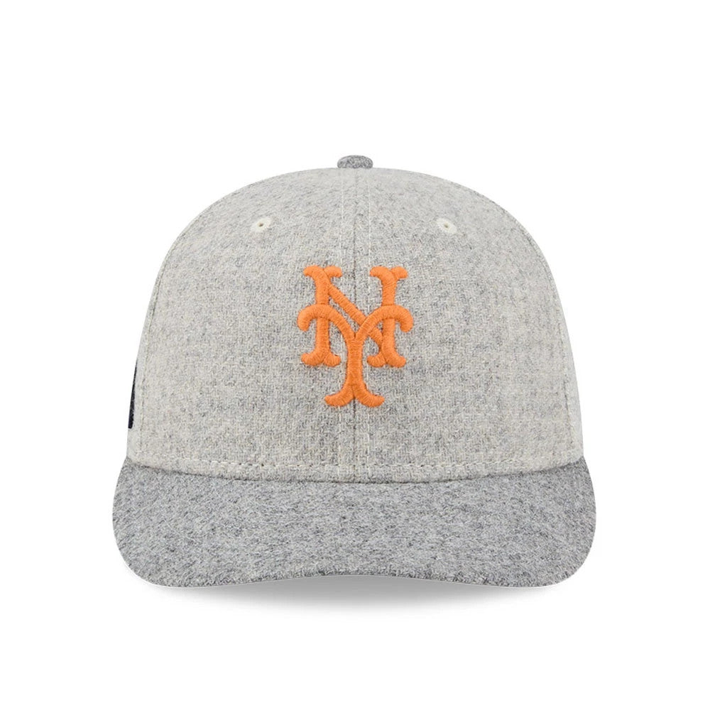 New York Mets MLB X Moon Light Beige New Era 59FIFTY Fitted Cap, front view showing the raised orange New York Mets logo on the structured beige crown, with a textured grey visor and matching top button.