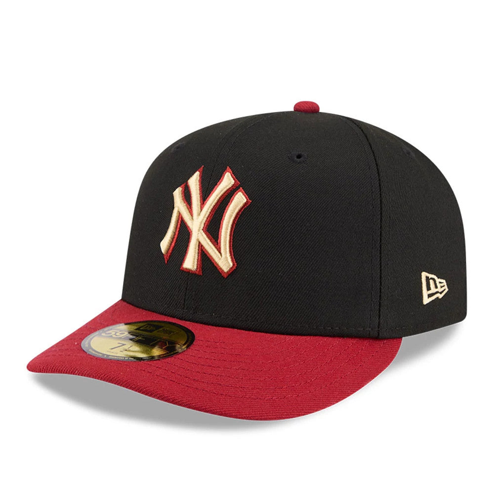 New York Yankees MLB Team Cards Black New Era 59FIFTY Fitted Cap, three-quarter view with raised tan NY logo outlined in red on the front panel, red flat visor with gold 59FIFTY size sticker, and New Era flag logo on the left side.