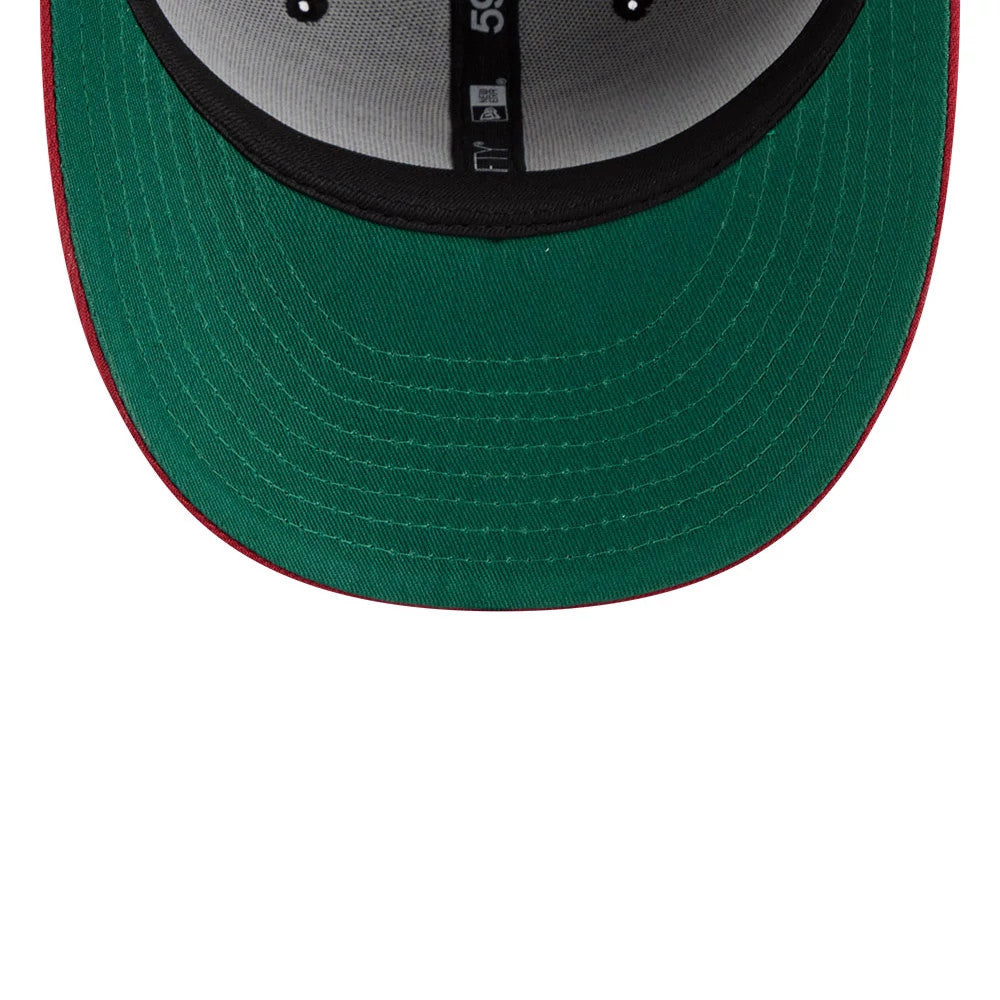 New York Yankees MLB Team Cards Black New Era 59FIFTY Fitted Cap, inside view showing green undervisor, contrasting black sweatband, and woven taping with 59FIFTY branding along the cap's interior.