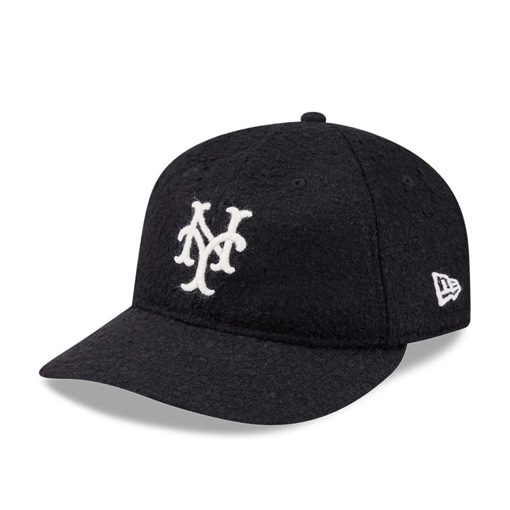 New York Mets MLB X Moon Navy Retro Crown New Era 9FIFTY Adjustable Cap, three-quarter view showing a white embroidered Mets logo on the front panel and the New Era flag logo on the left side of the soft, unstructured navy crown with a curved visor.