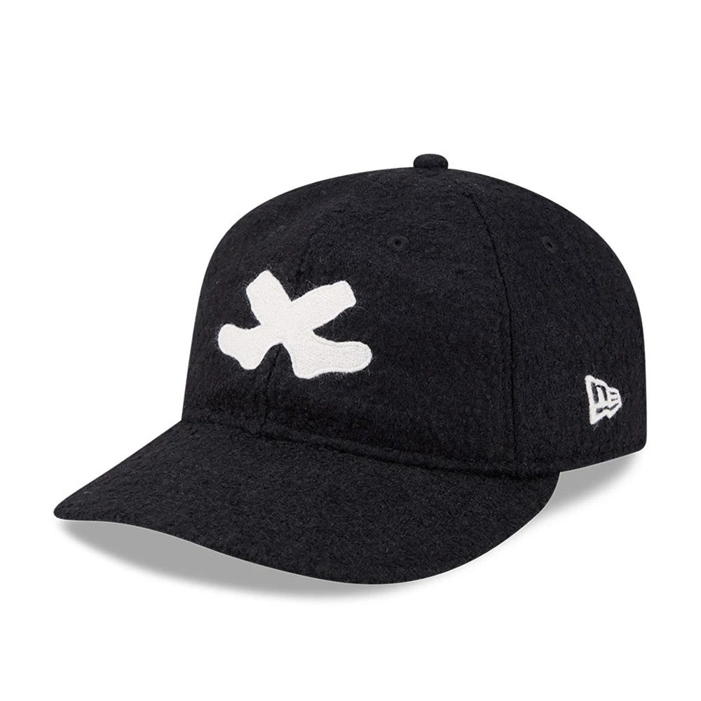 Chicago White Sox MLB X Moon Navy Retro Crown New Era 9FIFTY Adjustable Cap, three-quarter view showing a large white embroidered X logo on the front panel, a navy curved visor and the New Era flag logo on the left side.