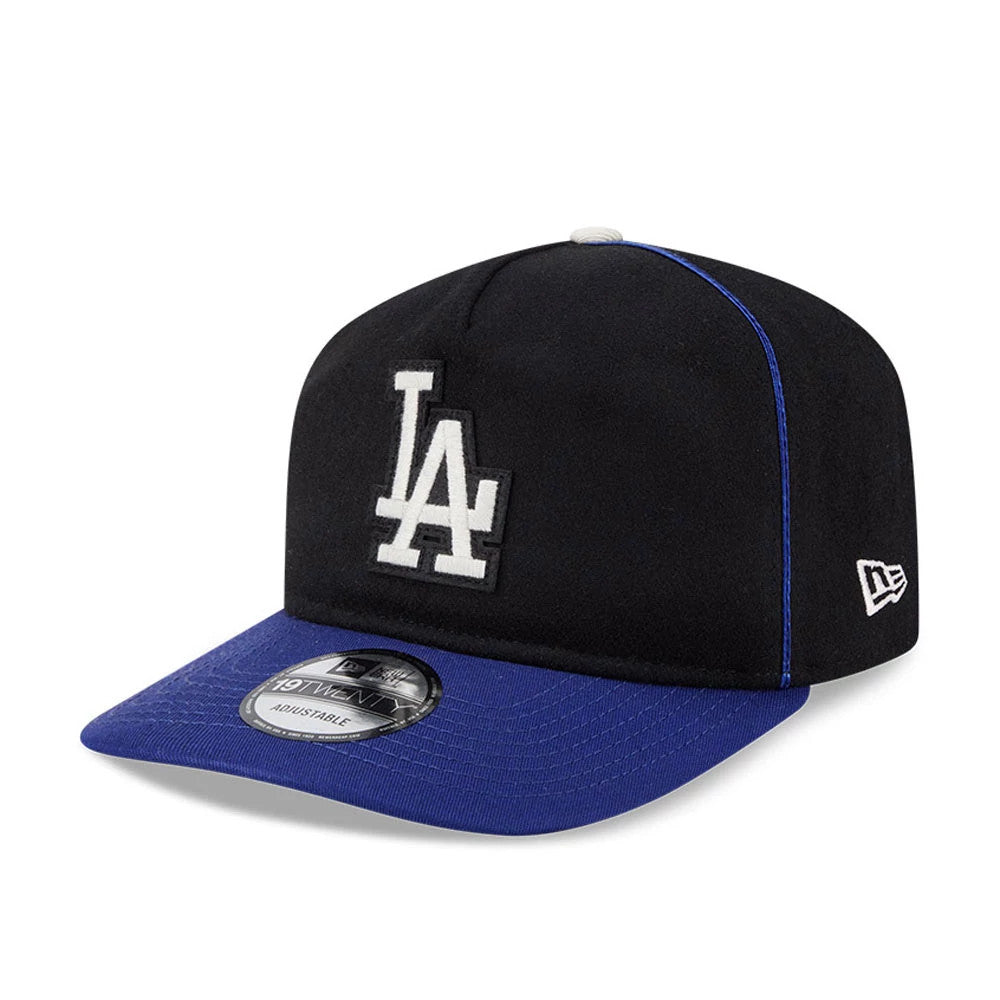 LA Dodgers MLB Felt Logo Dark Blue New Era 19TWENTY Adjustable Cap, front view showing the white raised embroidered LA logo on the black crown, a royal blue visor with a 19TWENTY size sticker, and the New Era flag logo on the left side.