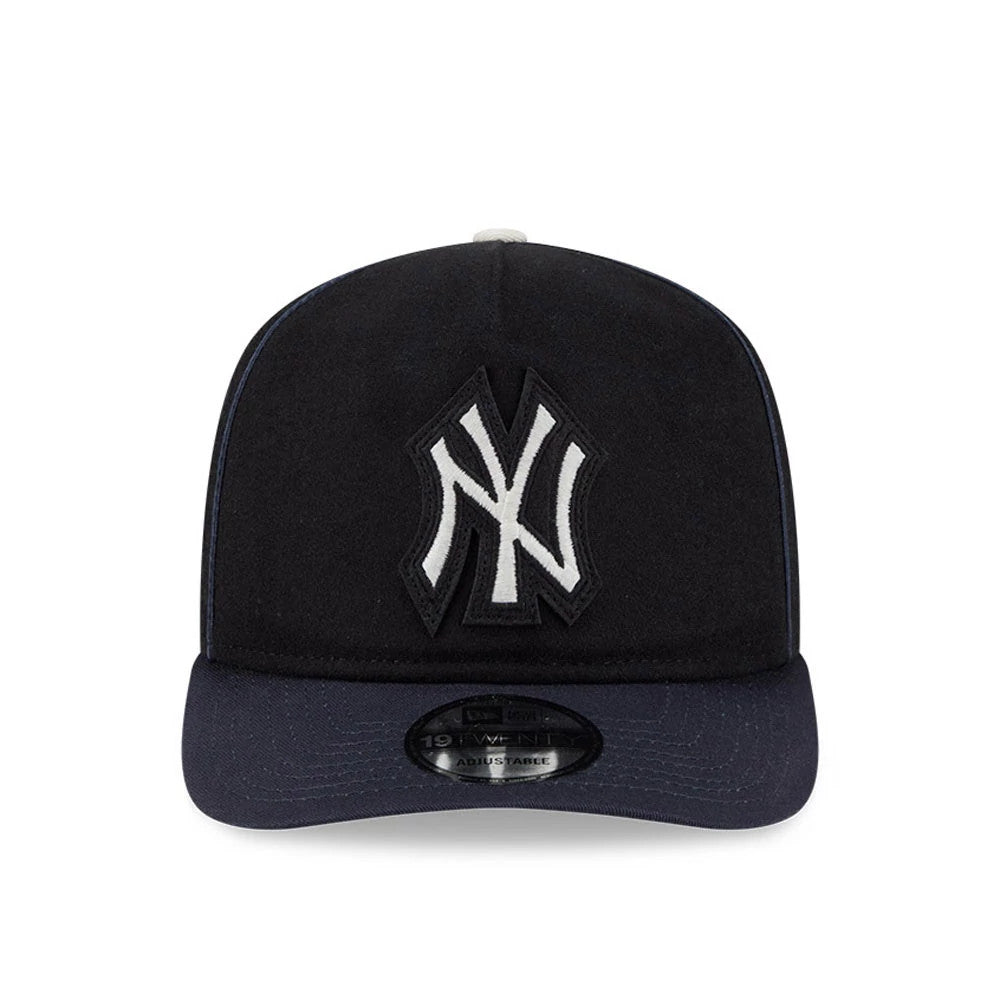 New York Yankees MLB Felt Logo Navy New Era 19TWENTY Adjustable Cap, front view showing a large raised white and black Yankees felt logo embroidered on the front panel with a navy curved visor and a 19TWENTY size sticker on the visor.