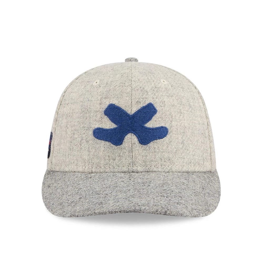 Chicago White Sox MLB X Moon Light Beige New Era 59FIFTY Fitted Cap, front view showing a blue embroidered X logo on the front panel, set on a light beige structured crown with a matching visored flat bill.
