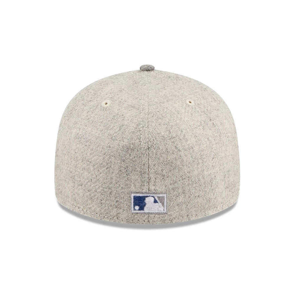 Chicago White Sox MLB X Moon Light Beige New Era 59FIFTY Fitted Cap, rear view showing the white embroidered MLB Batterman logo at the centre back, with a light beige textured crown and matching top button and eyelets.
