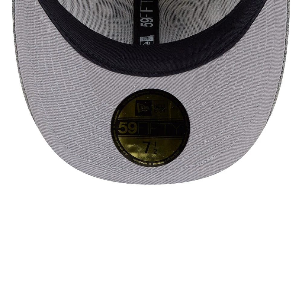 LA Angels MLB X Moon Light Beige New Era 59FIFTY Fitted Cap, inside view showing black sweatband, grey undervisor, black and white taping with logo, and a gold 59FIFTY size sticker at the centre.