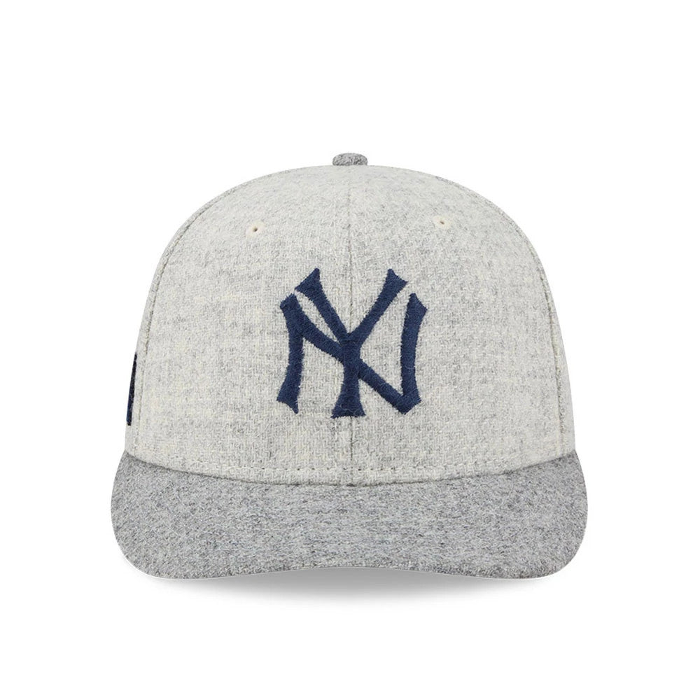 New York Yankees MLB X Moon Light Beige New Era 59FIFTY Fitted Cap, front view showing the large navy embroidered NY logo on the structured light beige crown with a contrasting grey visor and light eyelets.