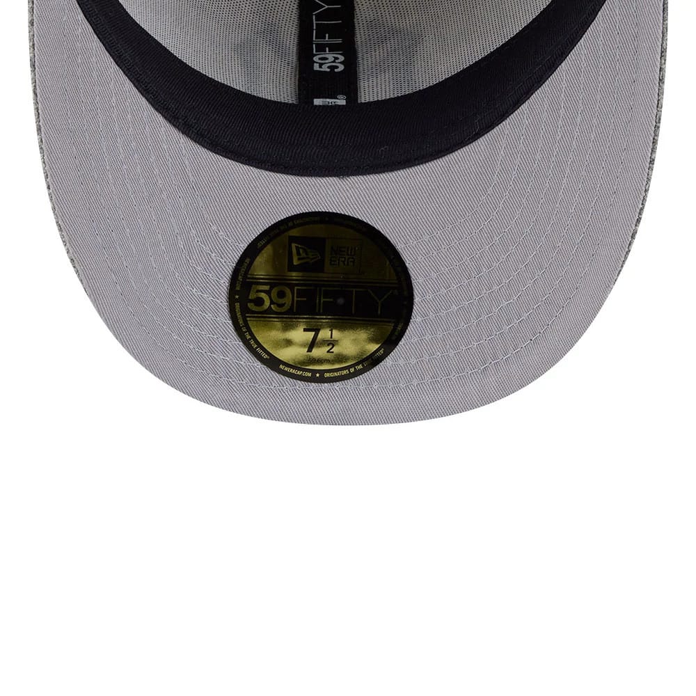 New York Yankees MLB X Moon Light Beige New Era 59FIFTY Fitted Cap, inside view showing a grey undervisor with a black sweatband, branded black taping, and a gold 59FIFTY size sticker displayed prominently.