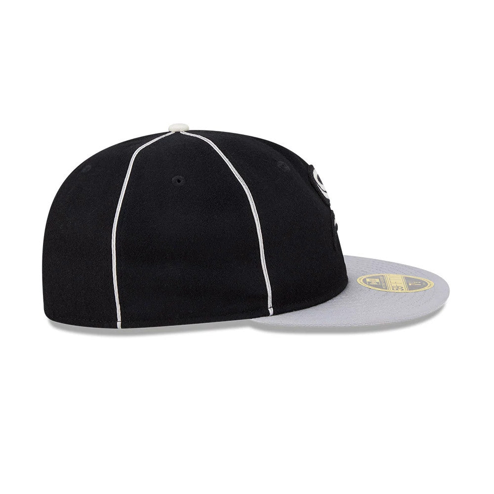 Chicago White Sox MLB Felt Logo Black Retro Crown New Era 59FIFTY Fitted Cap, side view showing the structured black crown with white piping, grey flat visor with a gold 59FIFTY size sticker, and a white top button.