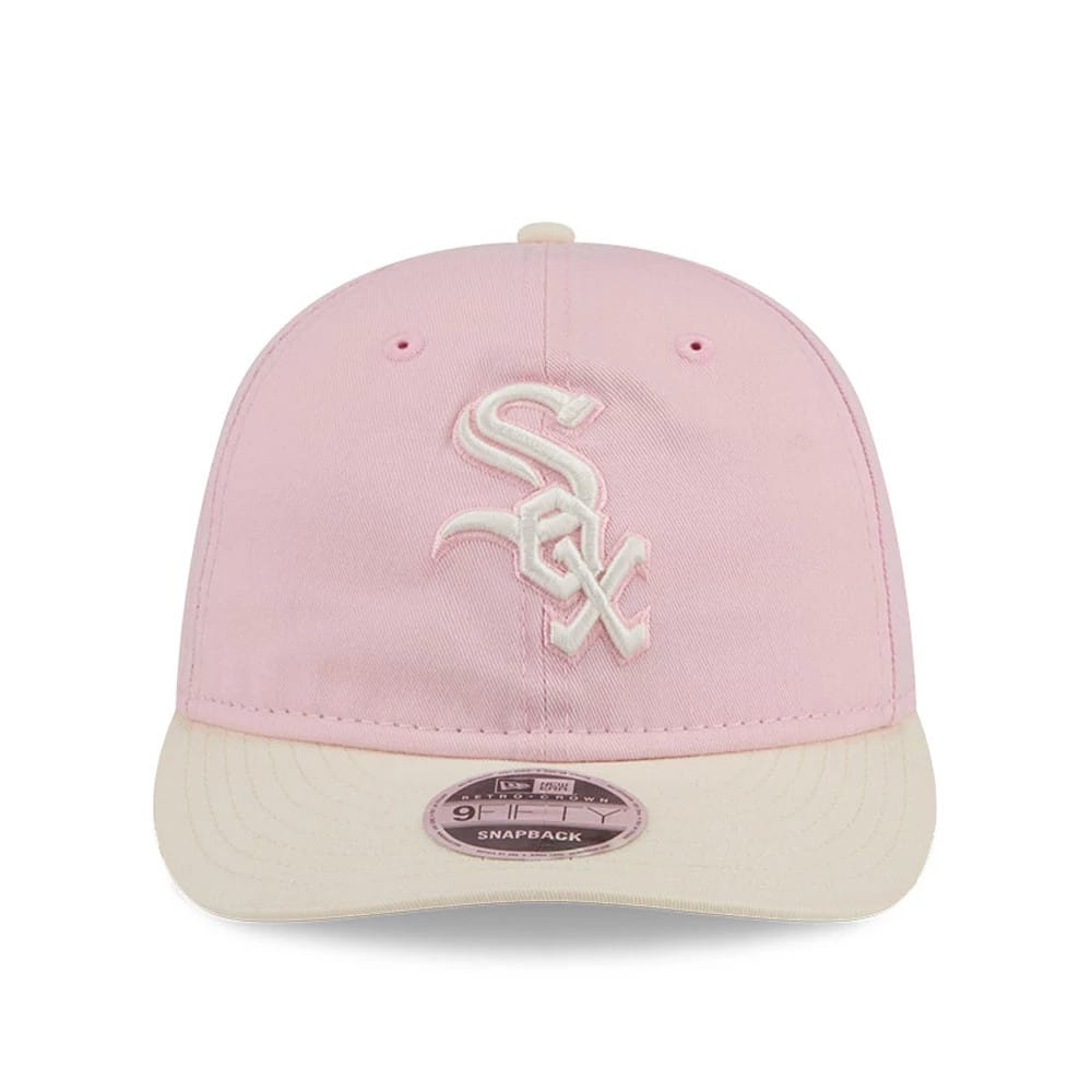 Chicago White Sox MLB Washed Tie Dye Pastel Pink New Era 9FIFTY Snapback Adjustable Cap, front view showing the raised white Sox logo embroidered on the light pink front panel, with a cream-coloured visor and a 9FIFTY size sticker.