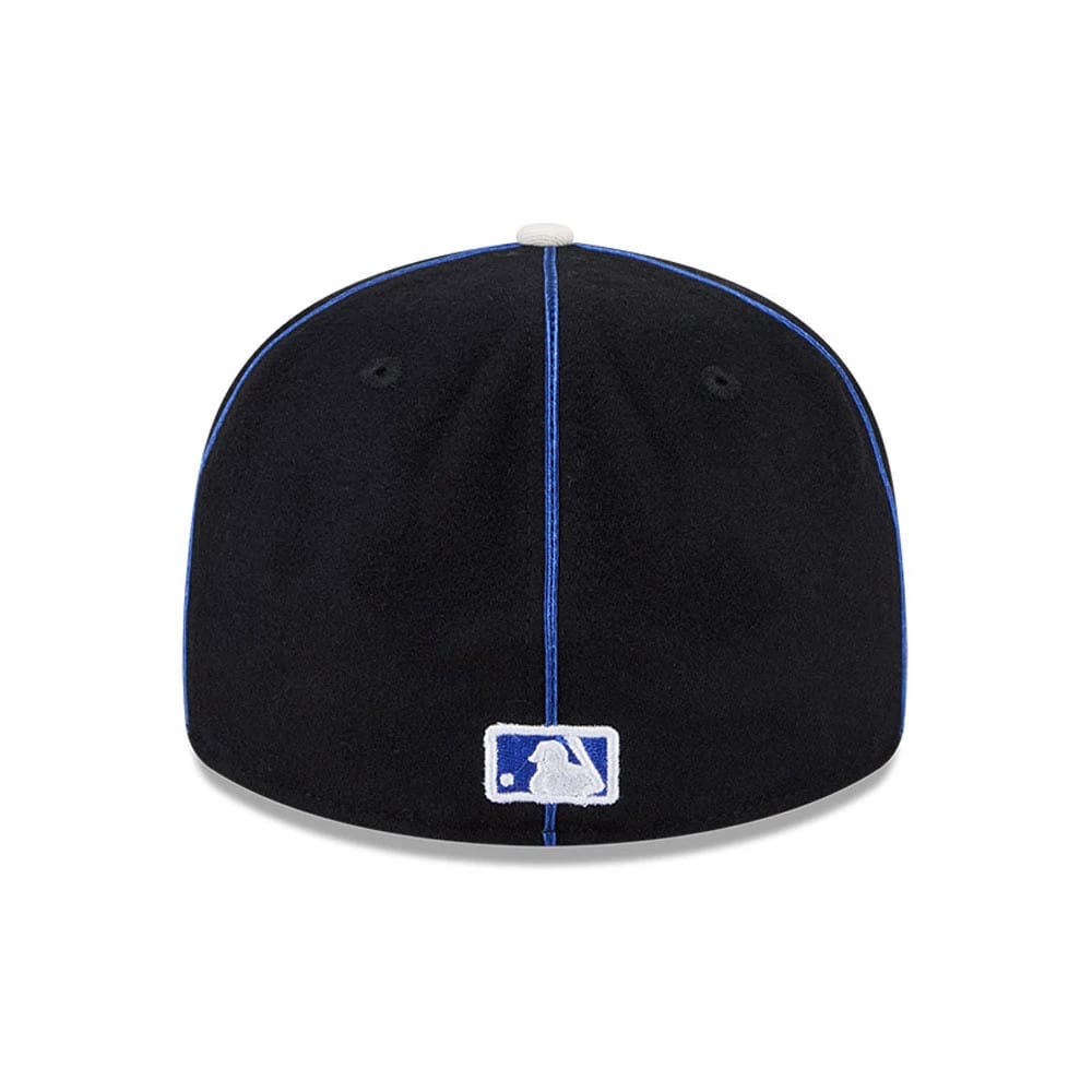 Pictured is this MLB Felt Logo New York Mets Retro Crown 59FIFTY Fitted cap in blue. 7