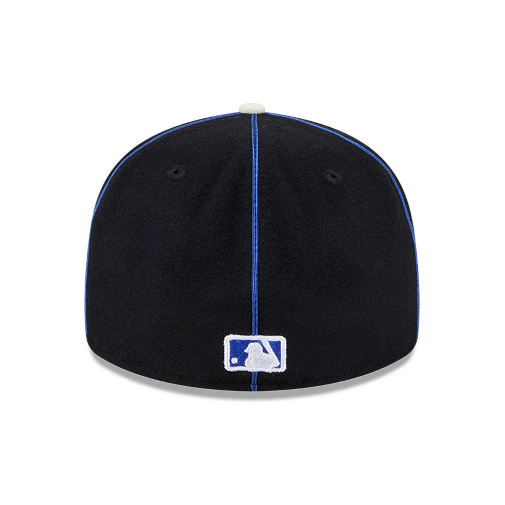 Pictured is this MLB Felt Logo New York Mets Retro Crown 59FIFTY Fitted cap in blue. 7