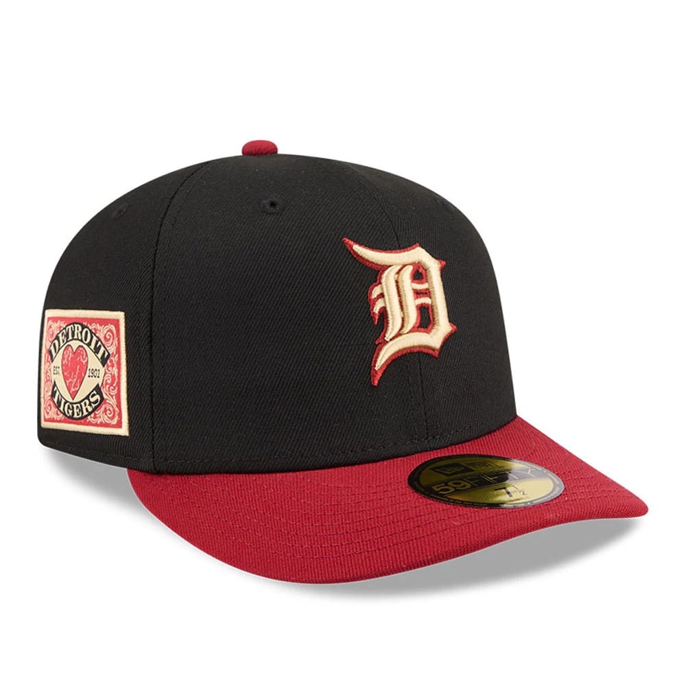 Detroit Tigers MLB Team Cards Black New Era 59FIFTY Fitted Cap, three-quarter view showing raised red and cream D logo embroidered on black crown, gold 59FIFTY size sticker, and a red flat visor with a detailed Detroit Tigers patch on the side.