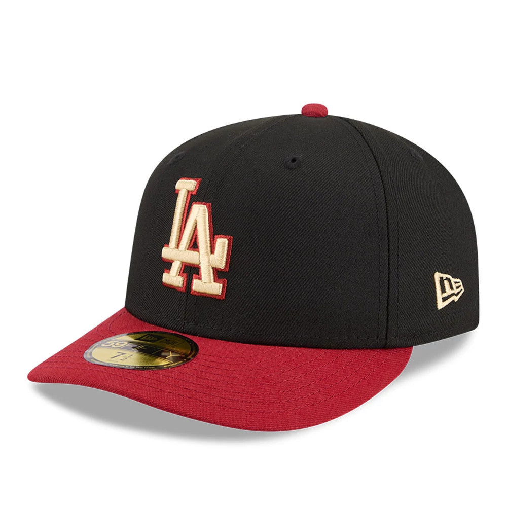 LA Dodgers MLB Team Cards Black New Era 59FIFTY Fitted Cap, three-quarter view showing the raised white and red embroidered LA logo on the black crown, red visor with a gold 59FIFTY size sticker, and gold New Era flag on the left side.