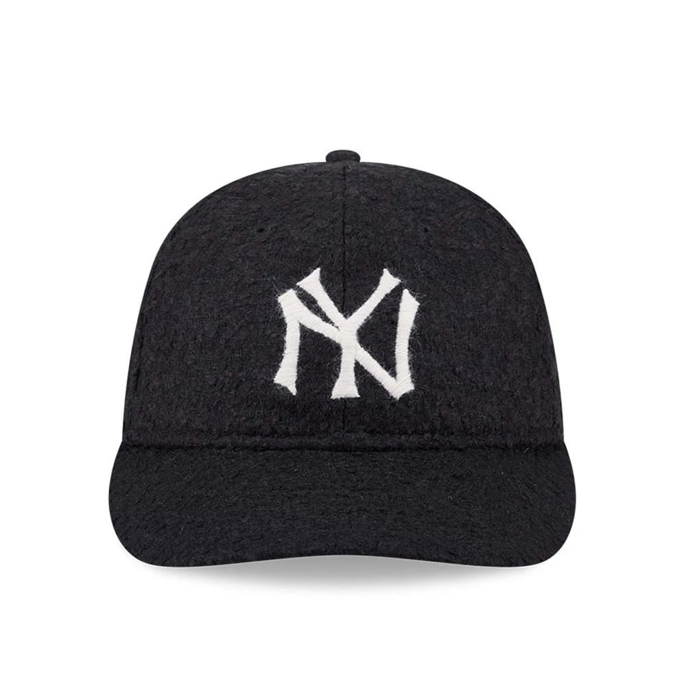 New York Yankees MLB X Moon Navy Retro Crown New Era 9FIFTY Adjustable Cap, front view showing the white raised embroidered NY logo on the navy textured fabric front panel, with a slightly curved visor and top button.