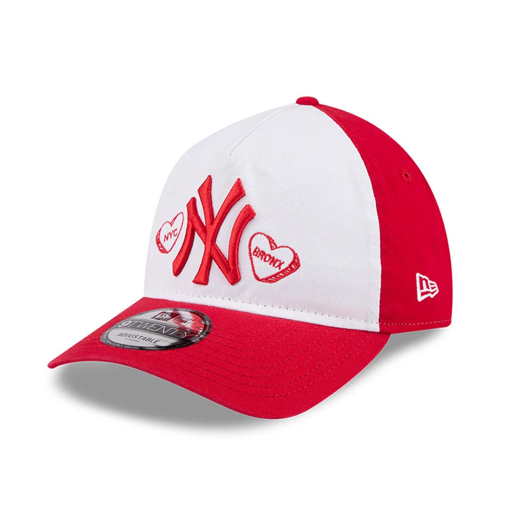 New York Yankees MLB Conversation Hearts Red New Era 9TWENTY A-Frame Adjustable Cap, three-quarter view showing the red embroidered NY logo on the white front panel, with heart graphics, a red visor and New Era flag logo on the left side.
