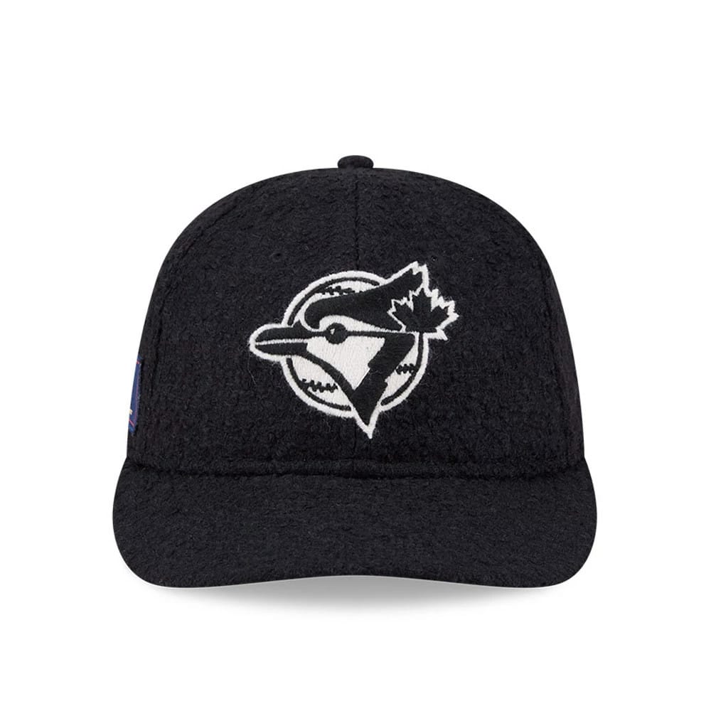Toronto Blue Jays MLB X Moon Navy Retro Crown New Era 9FIFTY Adjustable Cap, front view showing the white embroidered Blue Jays logo with outlines on the front panel, paired with a navy flat visor and a textured crown.