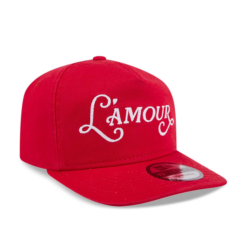New Era L'amour Red New Era 19TWENTY Adjustable Cap, front view showing the white embroidered L'amour lettering on the structured red crown, with a matching red flat visor and a 19TWENTY size sticker on the visor.