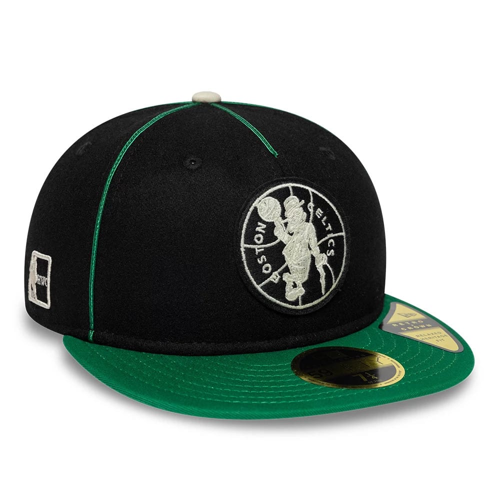 Boston Celtics NBA Felt Logo Green Retro Crown New Era 59FIFTY Fitted Cap, three-quarter view showing the grey embroidered team logo on the front panel, a green flat visor with a gold 59FIFTY size sticker, and a white side logo.